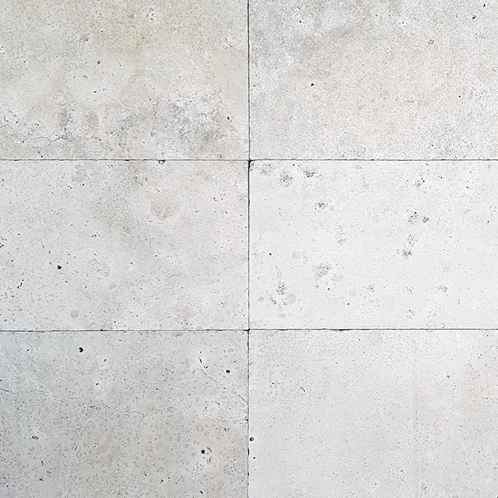 Grano Mix Antiqued Tumbled Unfilled Travertine Paver 1.jpg